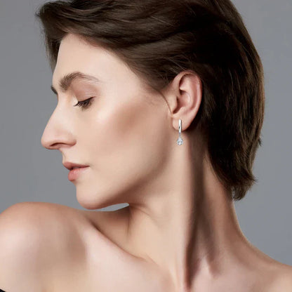 Pear cut moissanite hoop earrings in 925 sterling silver with teardrop design and high brilliance stones