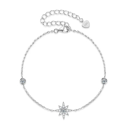 Moissanite Star Bracelet with pavé-set moissanite stars in 14K gold-plated 925 sterling silver, available in white and yellow gold.