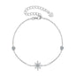 Moissanite Star Bracelet with pavé-set moissanite stars in 14K gold-plated 925 sterling silver, available in white and yellow gold.